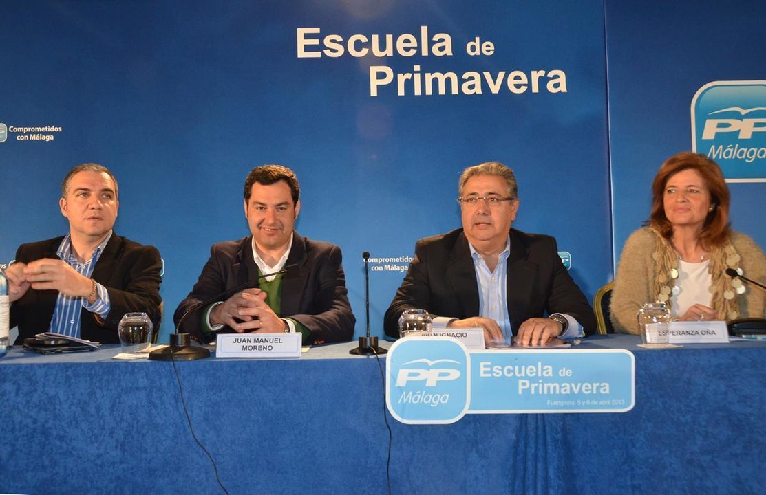 Juan Manuel Moreno Bonilla (izquierda), con Juan Ignacio Zoido (derecha) en un acto del PP andaluz.
