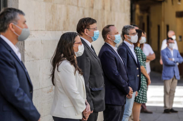 VALENCIA, SPAIN - JUNE 05: The president of the Generalitat, Ximo Puig (C), together with the vice-president of the Consell and Councillor for Equality and Inclusive Policies, M?nica Oltra (L), and four other members of the Consell observe a minute's silence as a sign of memory and recognition of the victims of the coronavirus in Spain during the last day of the official mourning period, on June 05, 2020 in Valencia, Spain. (Photo by Rober Solsona/Europa Press via Getty Images)