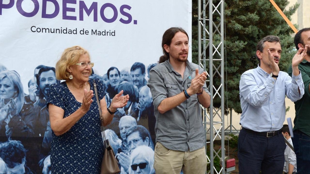 Manuela Carmena, Pablo Iglesias y José Manuel López, en un mitin de Podemos y Ahora Madrid.